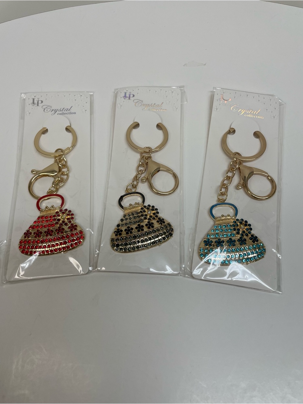 Gold Keychain Purse Charms in Red, Black & Blue Set of 3 - Picture 3 of 3